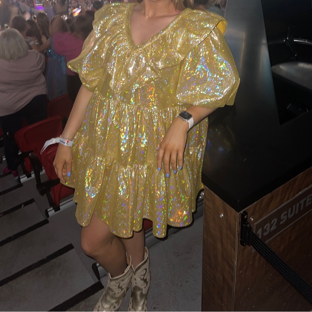 Gold Queen of Sparkles Dress! Size medium, but could comfortable fit a large.